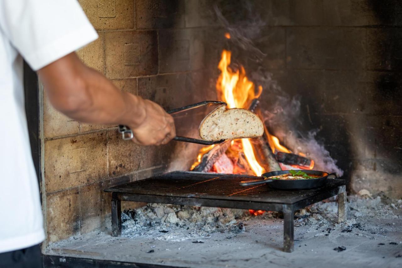 Outrigger Surin Beach Resort - Sha Extra Plus エクステリア 写真 Cooking with wood